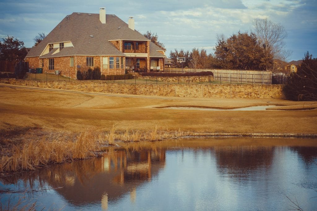 Residential home in Carrollton, Texas that overlooks a pond.
